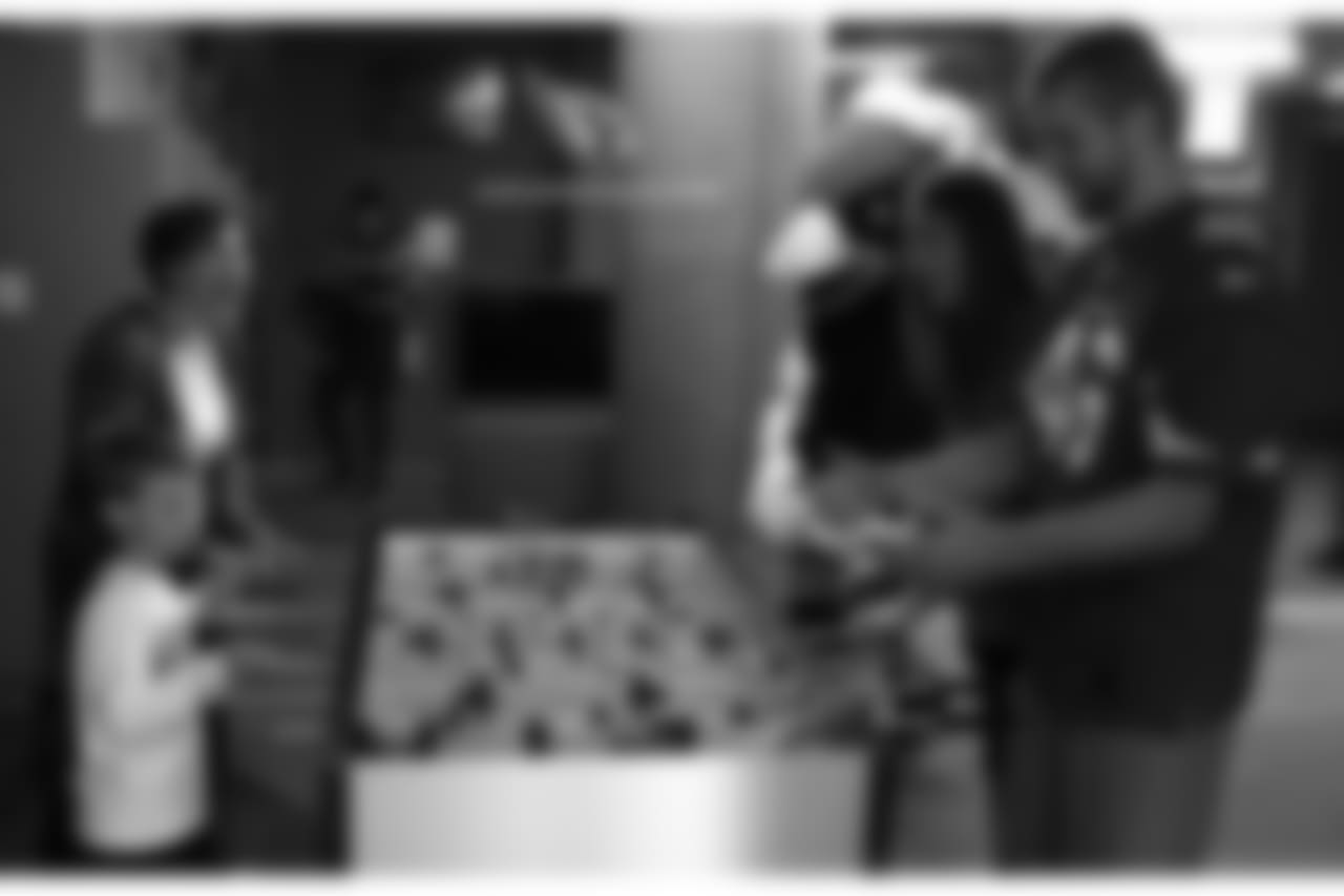 Aaron Brewer and his fiancee take on a patient and his mom in foosball