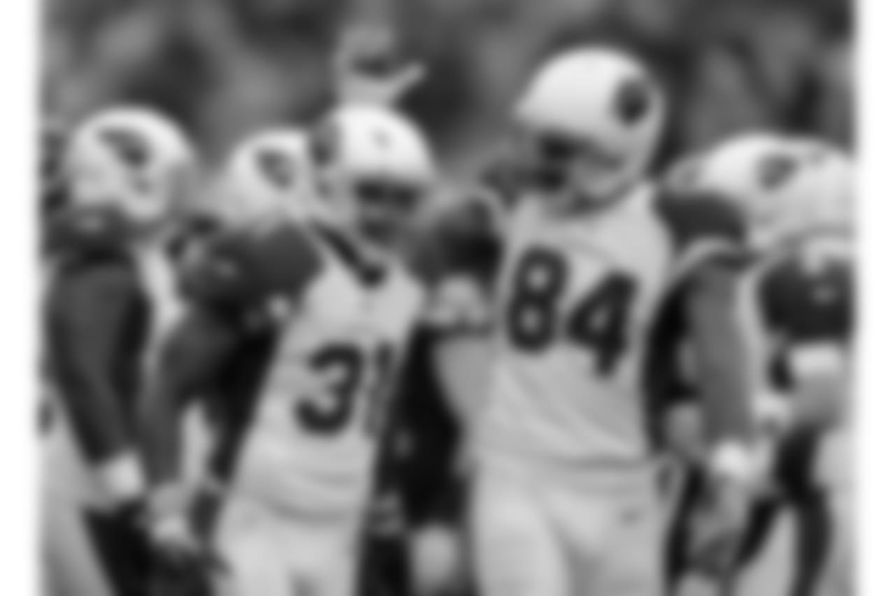 TE Jermaine Gresham (right) congratulates RB David Johnson (left) after the score