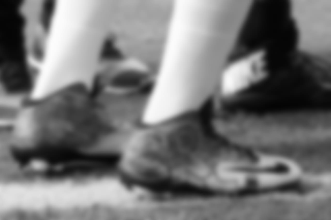 Campbell wearing cleats to support his "CRC" charity