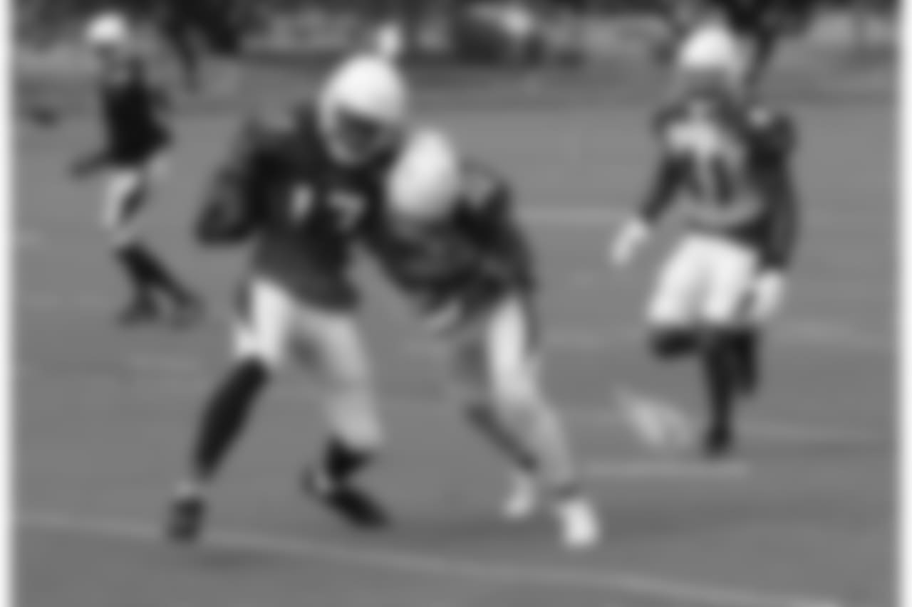 WR Larry Clark is hit by S Tyrann Mathieu