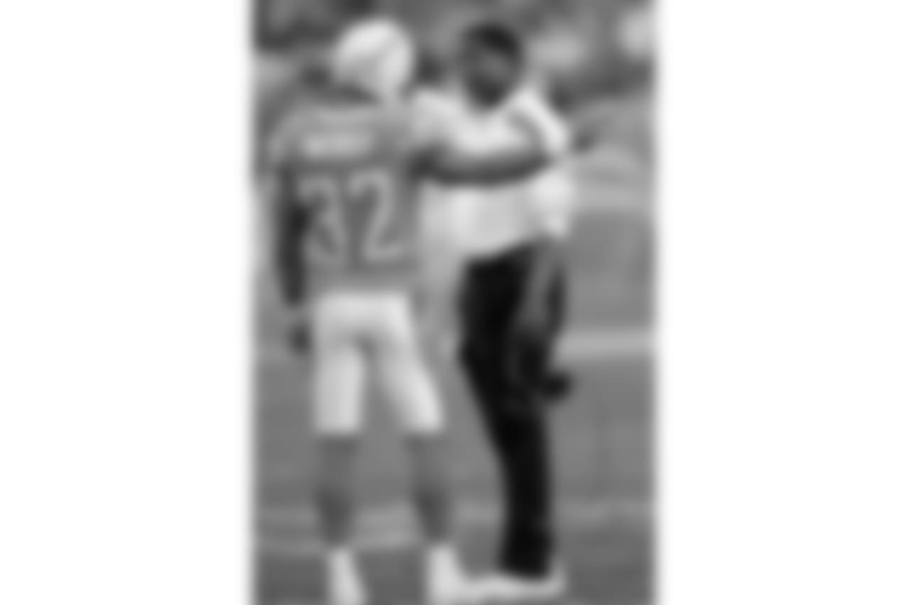 Wilks in 2011 with Chargers S Eric Weddle