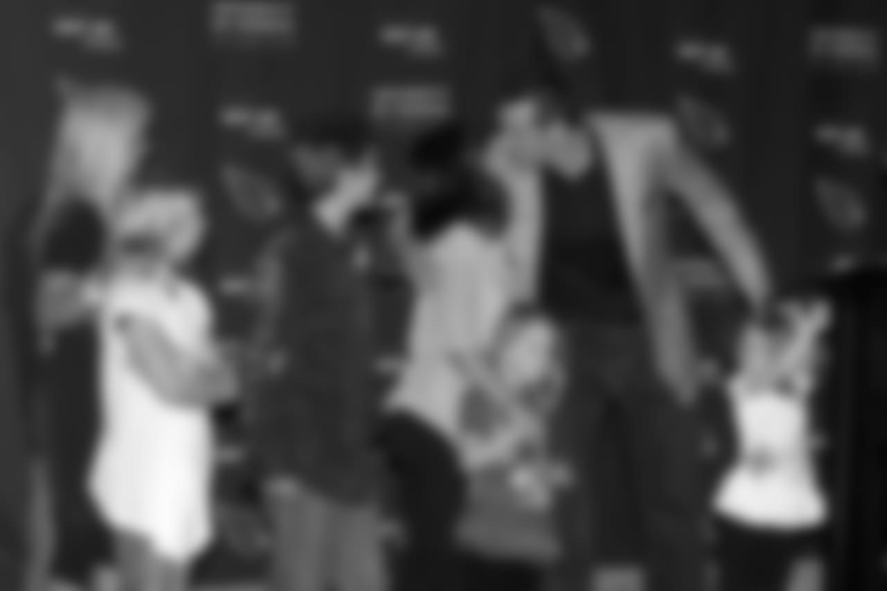 Warner with his family at his retirement ceremony
