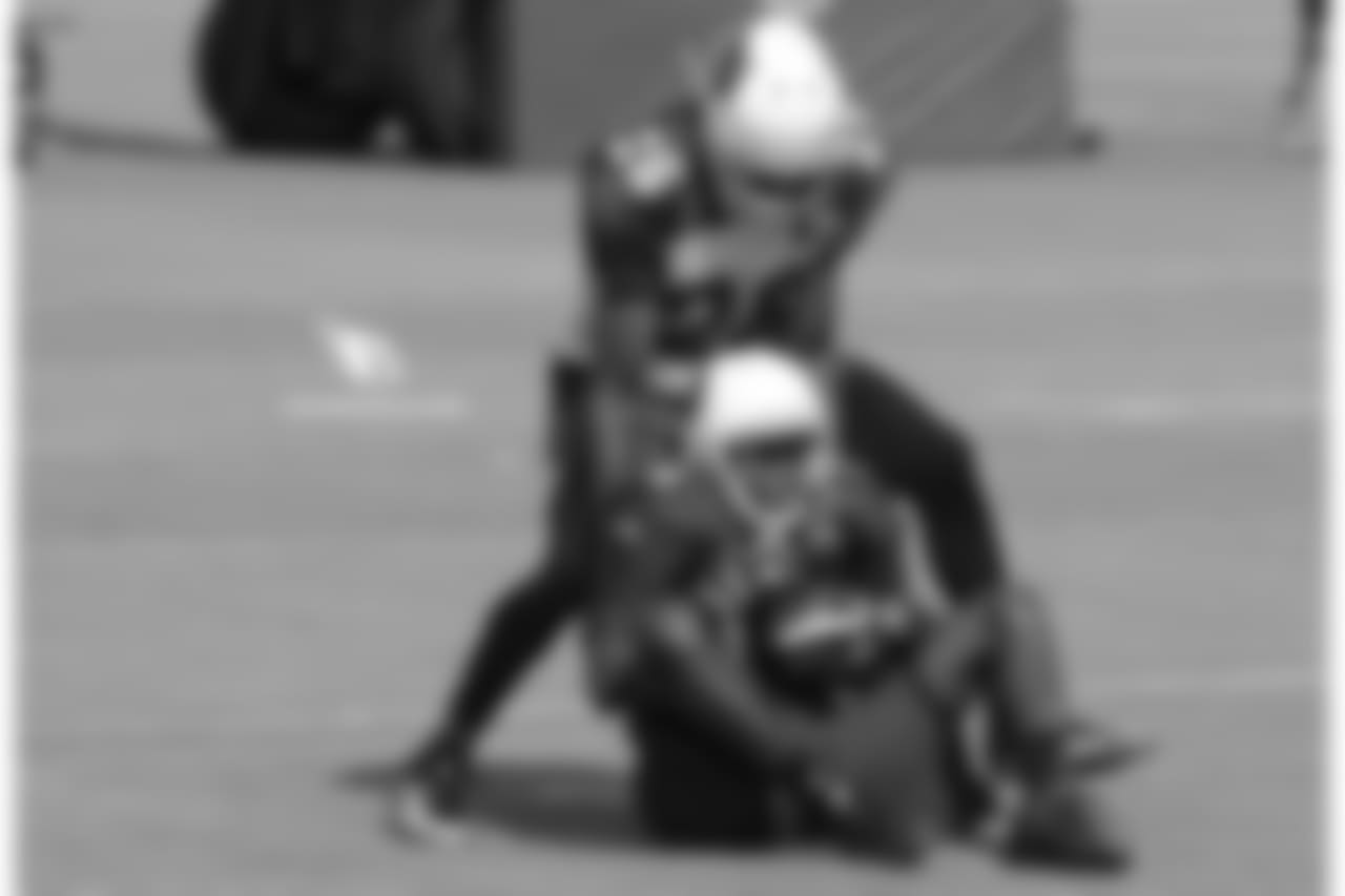 WR J.J. Nelson catches a pass in front of CB Brandon Williams