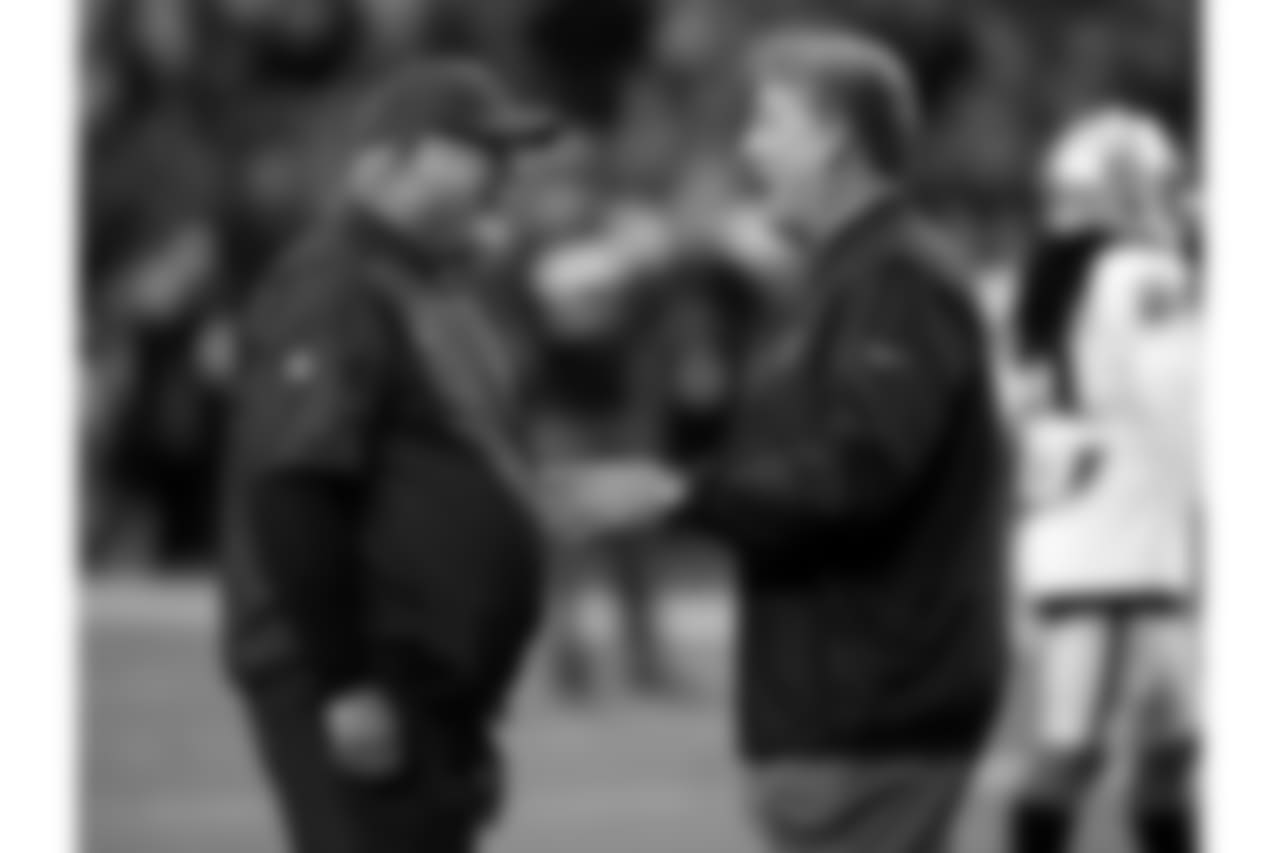 Coach Bruce Arians with Raiders coach Jack Del Rio