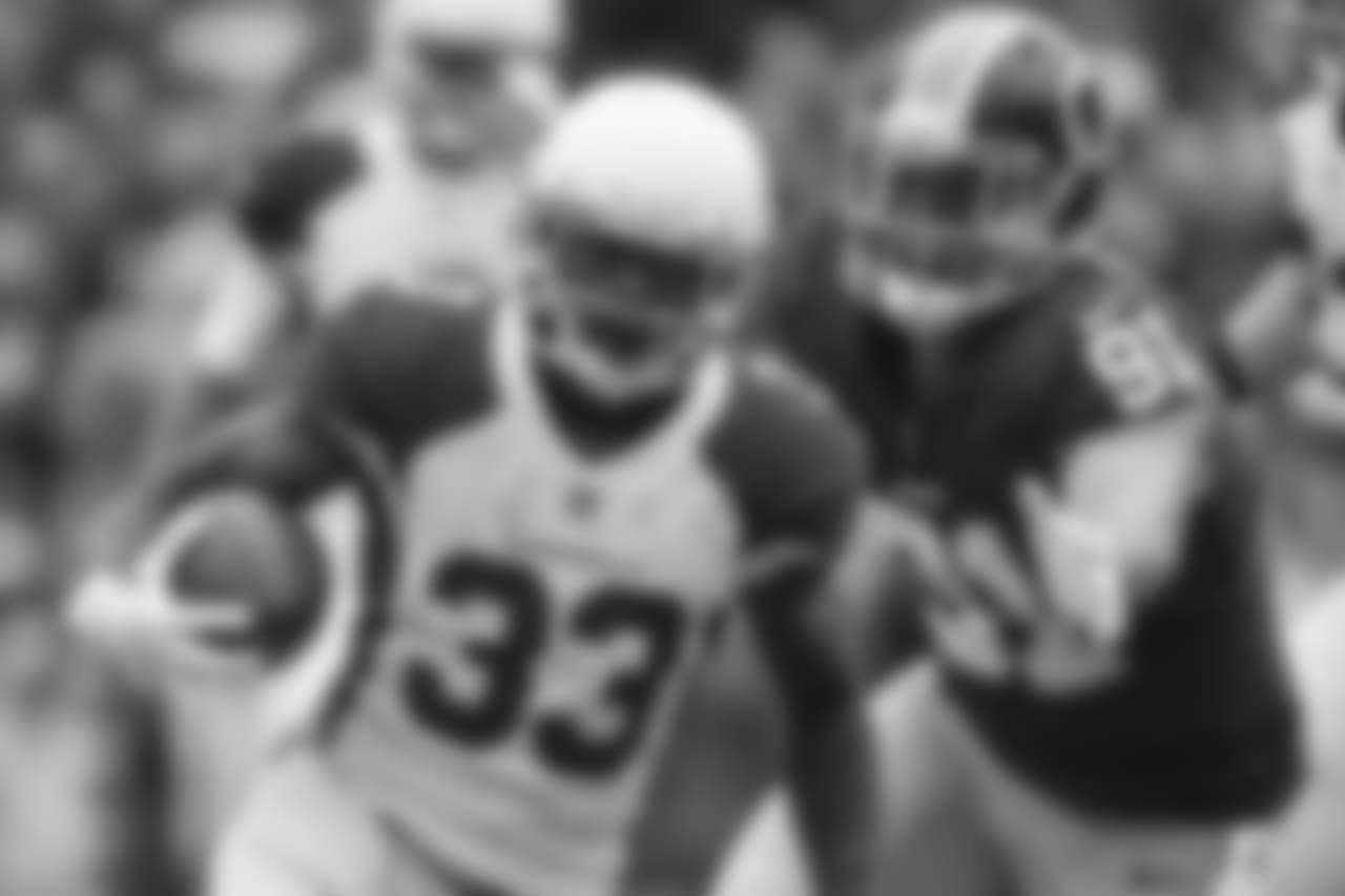RB Kerwynn Williams runs through the tackles