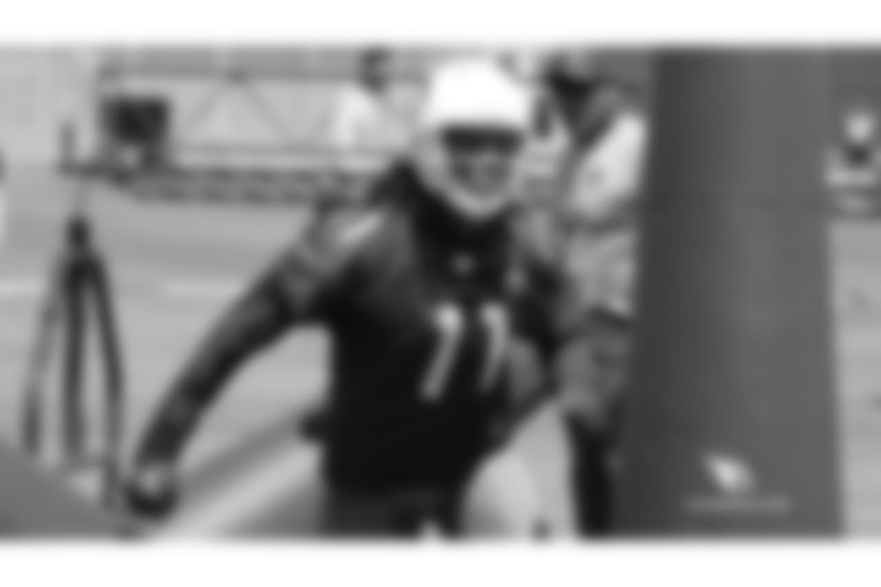 WR Larry Fitzgerald goes through defensive line drills