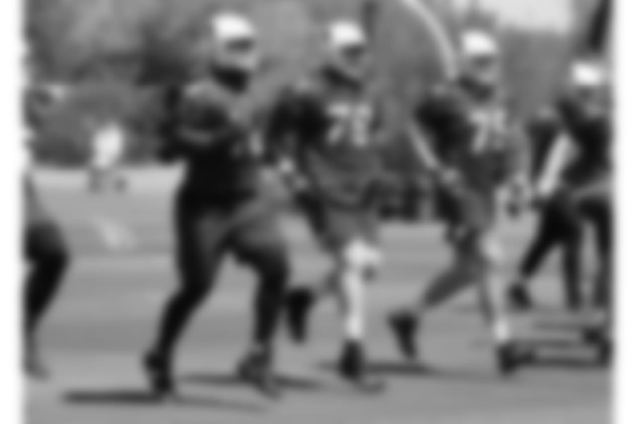 Offensive linemen warm up