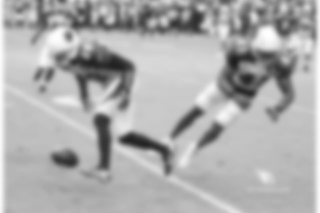 CB Justin Bethel (left) and S Antoine Bethea while going for an interception