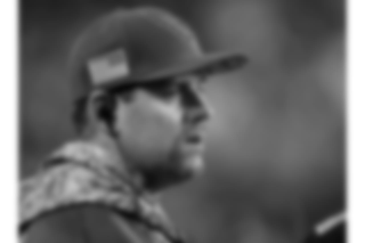 Injured QB Carson Palmer watches from the sideline