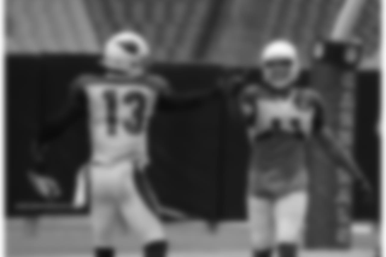WRs Jaron Brown and Larry Fitzgerald