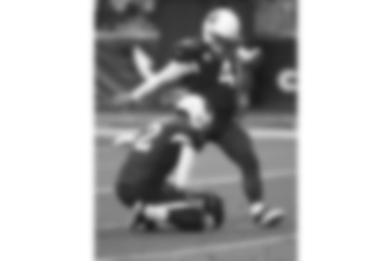 Cardinals K Phil Dawson with the kick attempt