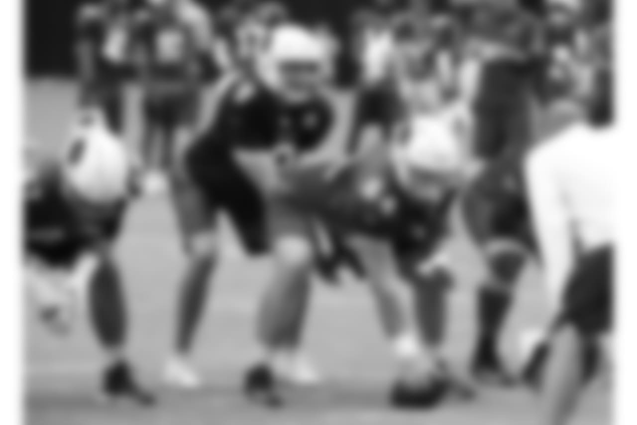 C Mason Cole and QB Sam Bradford