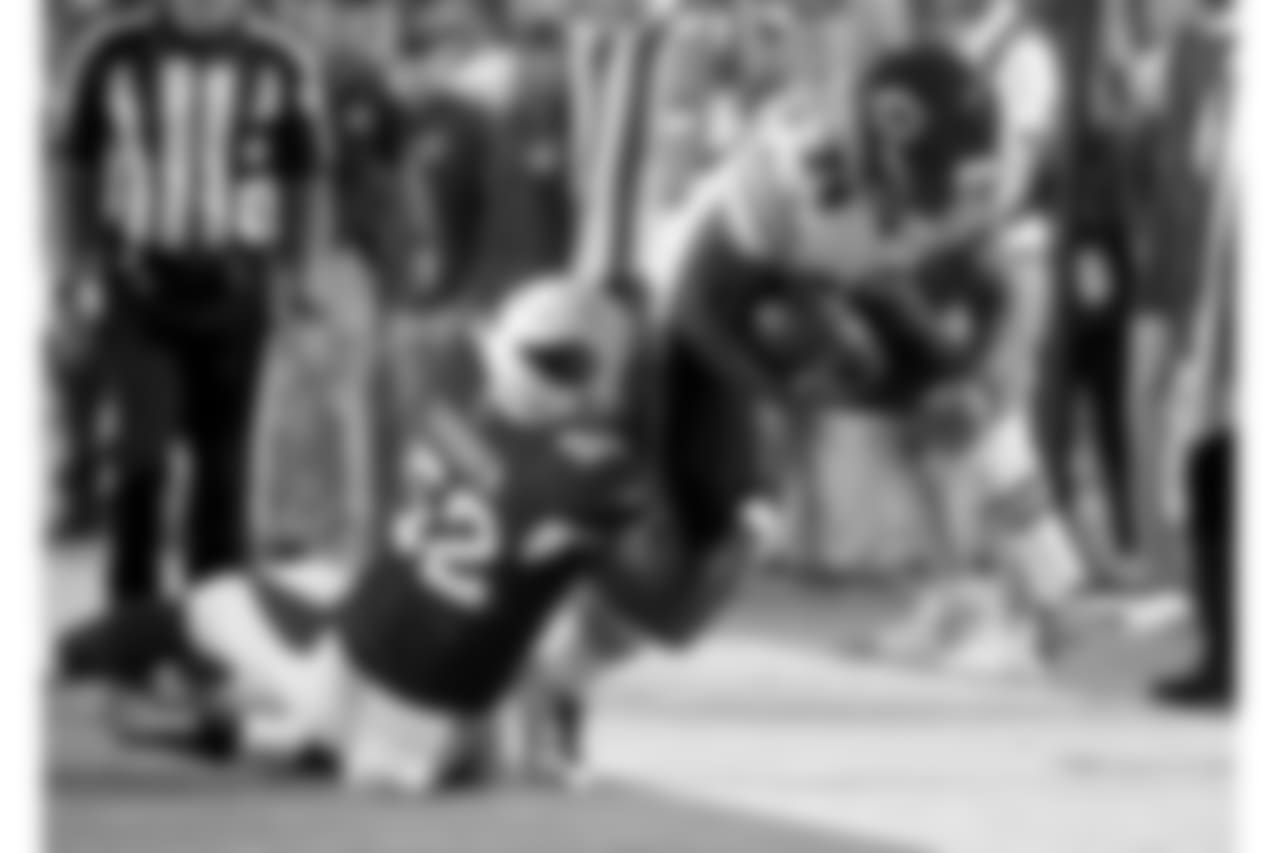 LB Zaviar Gooden holds on