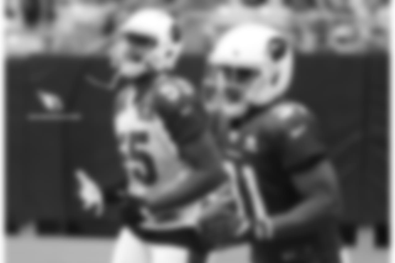 LB Chandler Jones (left) and RB David Johnson