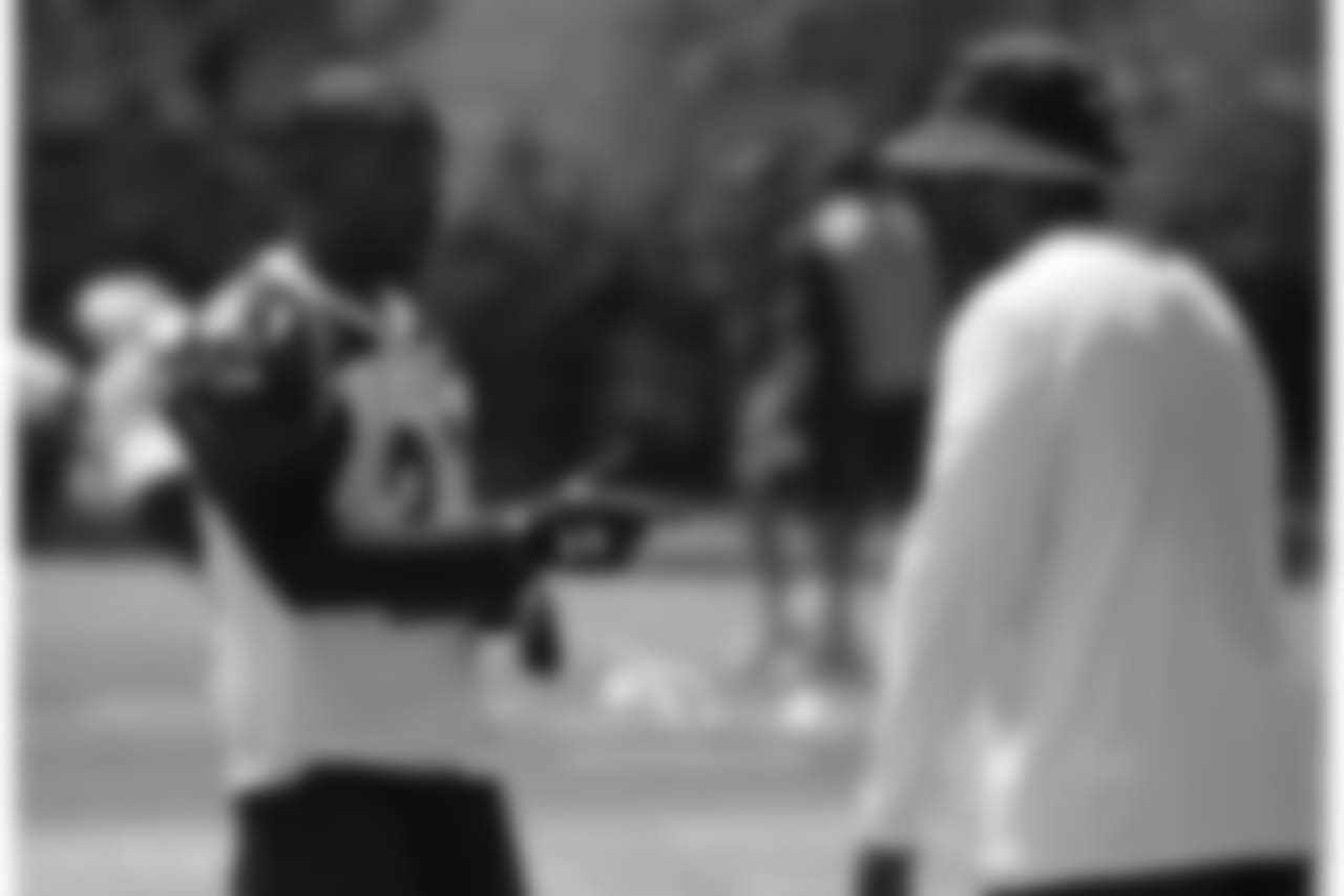 CB Patrick Peterson talks with defensive backs coach David Merritt