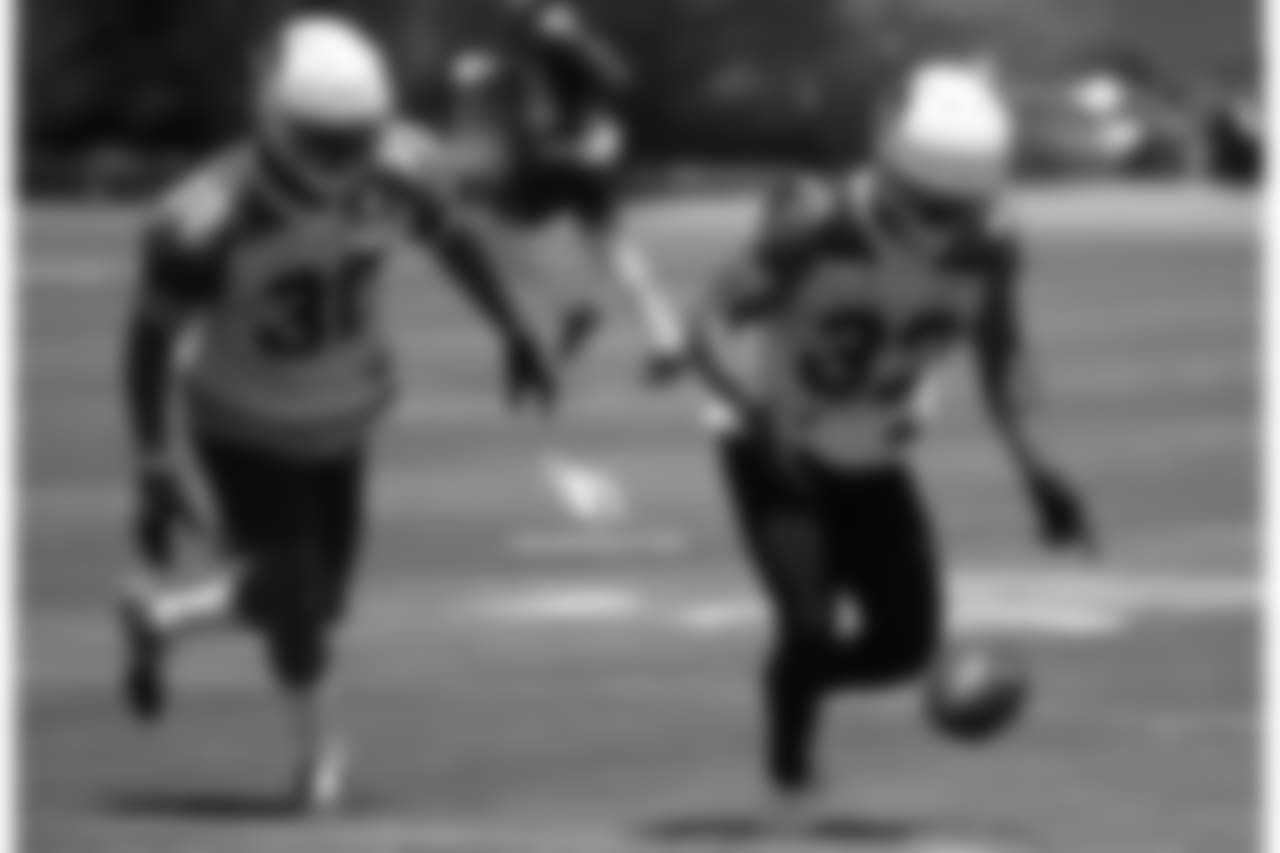 S Rudy Ford (left) and CB Lou Young III