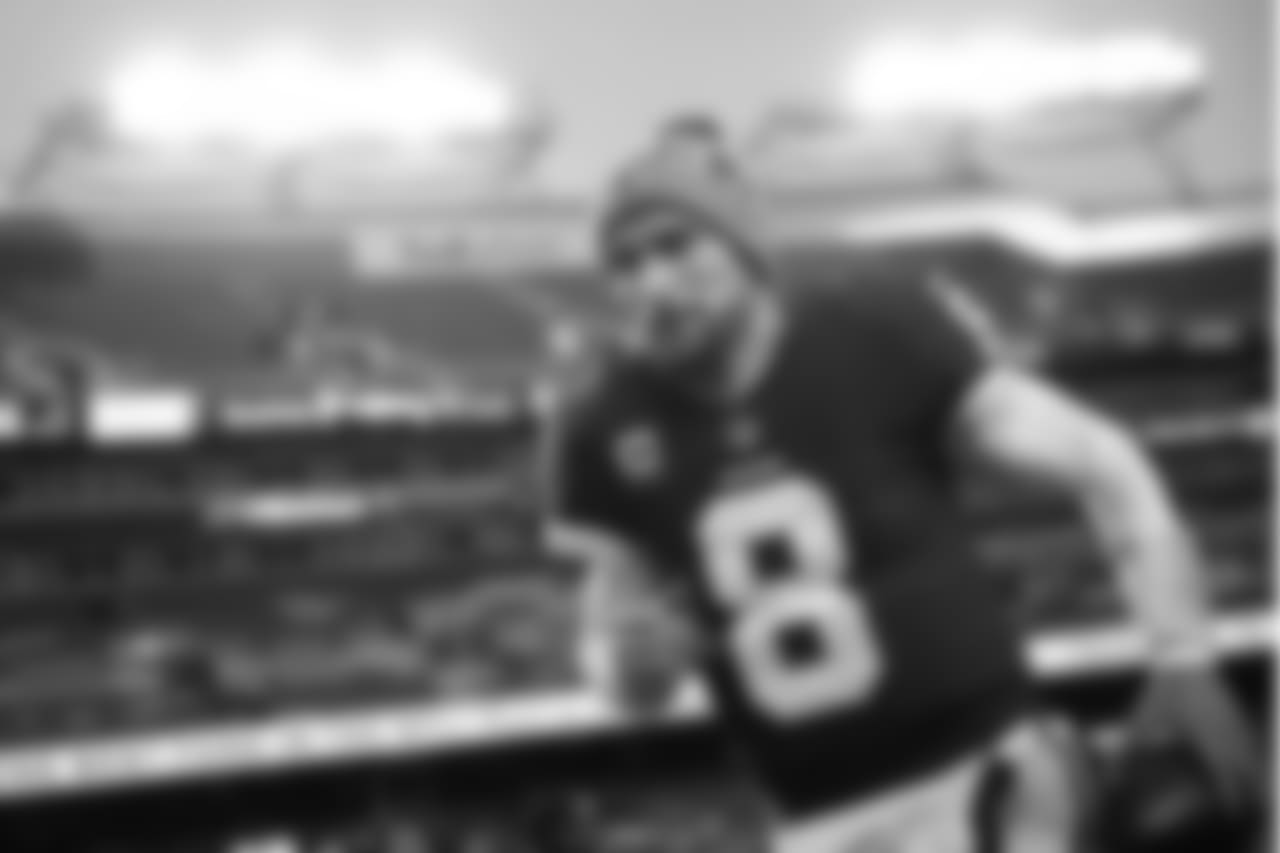 Redskins QB Kirk Cousins runs off FedExField after the game