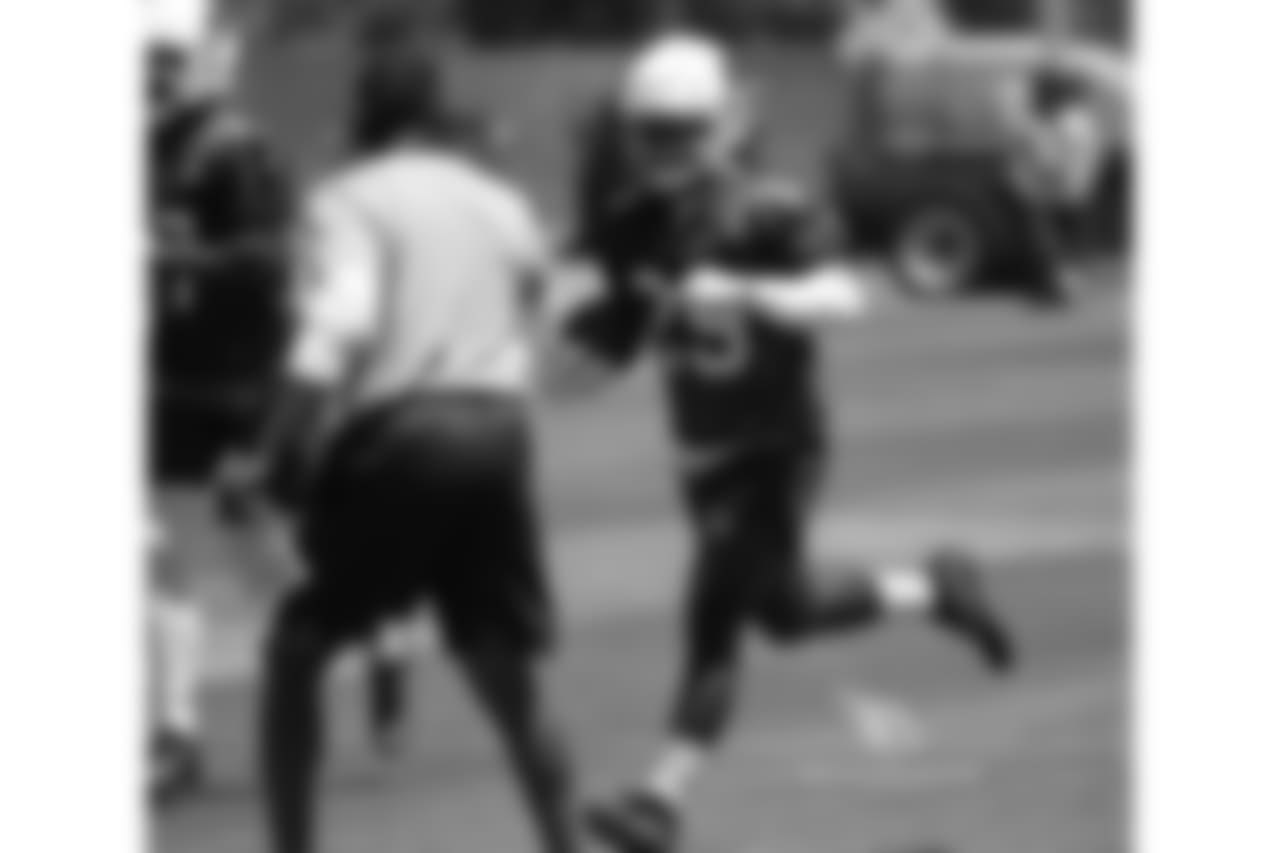 RB Chase Edmonds gets a fist bump from coach Steve Wilks