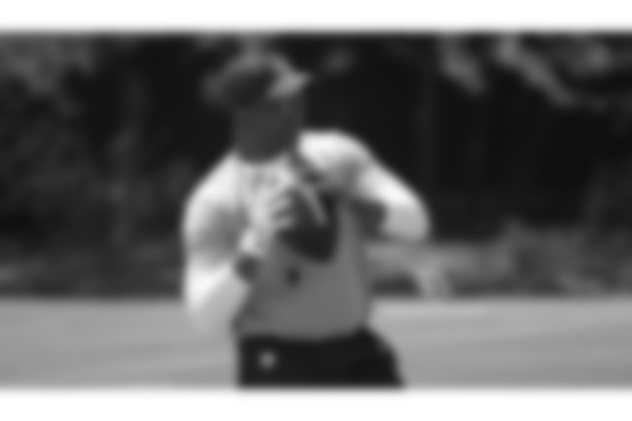 Coach Steve Wilks throws to DBs
