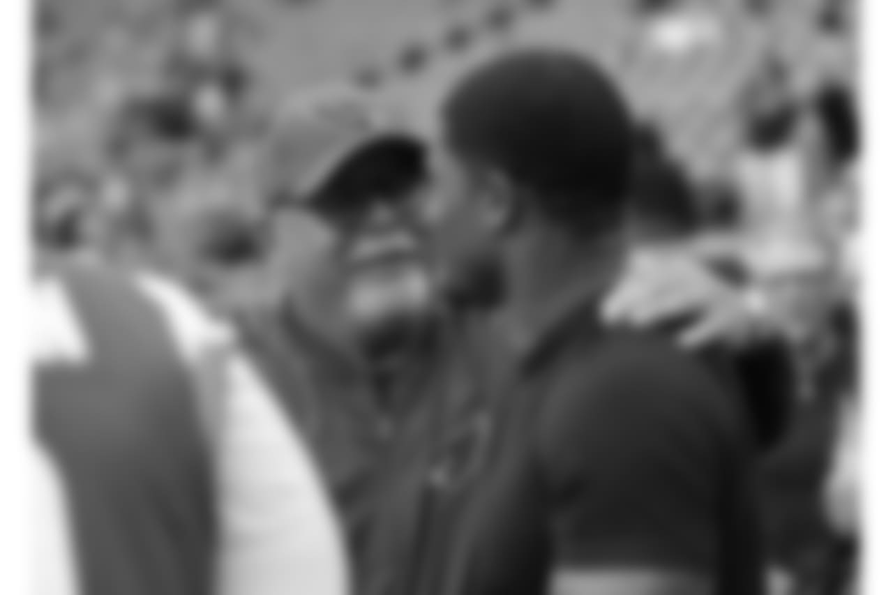 Coach Bruce Arians speaks with former Texans star Andre Johnson