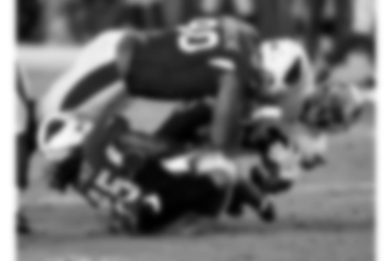DT Robert Nkemdiche and LB Josh Bynes on the tackle