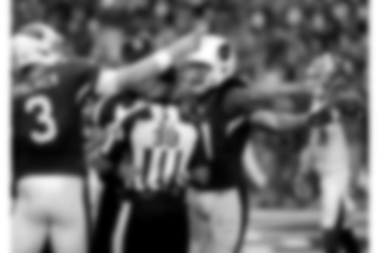 Palmer and Fitz pleading with the officials in a 2016 game against the Bucs