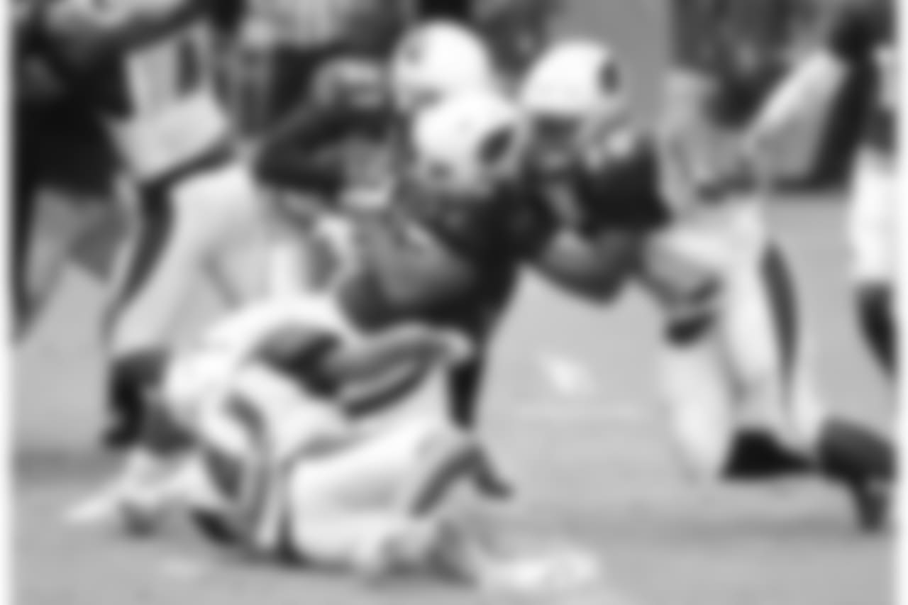 RB Elijhaa Penny pushes his way into the end zone