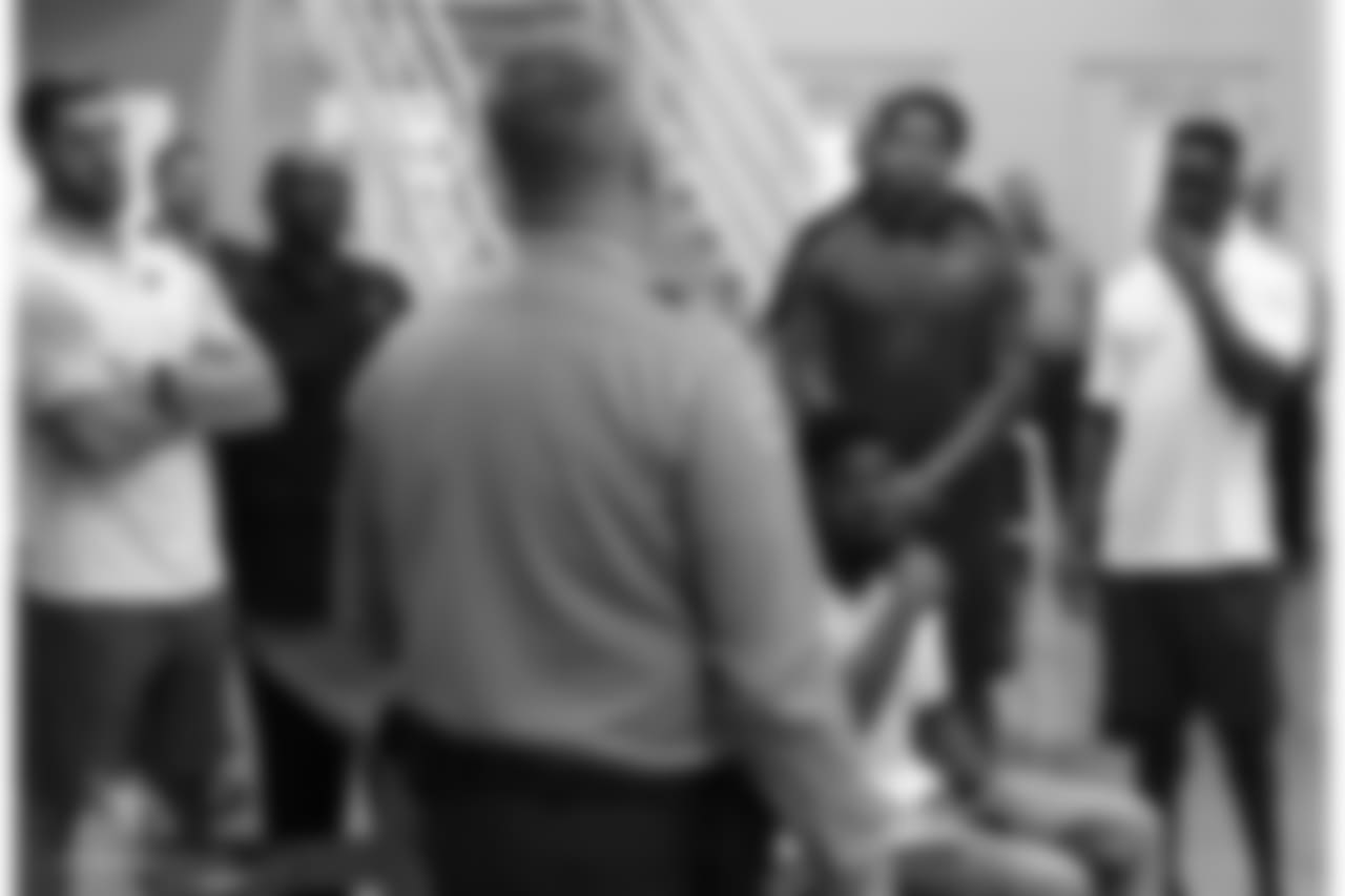QB Trevor Knight (left), RB T.J. Logan (sitting), LB Tre'Von Johnson (middle) and CB Daniel Gray hear about the jail