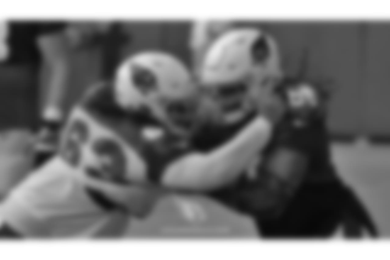 DL Siupeli Anau battles G Josh Allen.