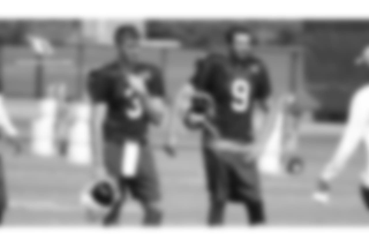 QB Josh Rosen (left) and QB Sam Bradford