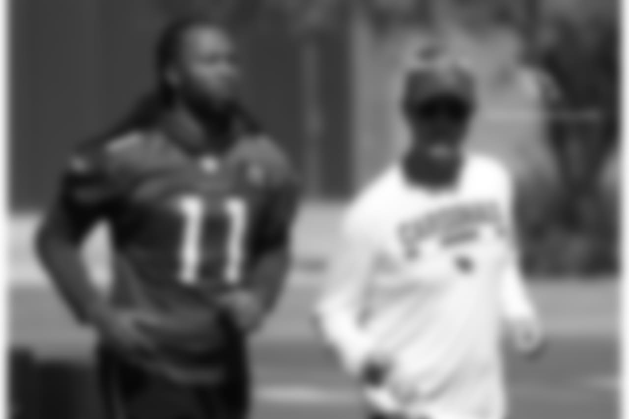 WR Larry Fitzgerald and offensive coordinator Mike McCoy