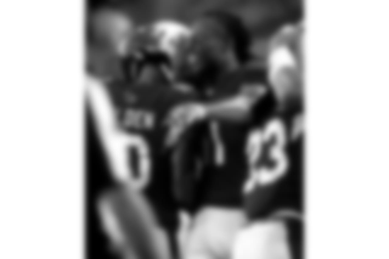 Larry Fitzgerald embraces WR Brittan Golden after Golden's touchdown reception