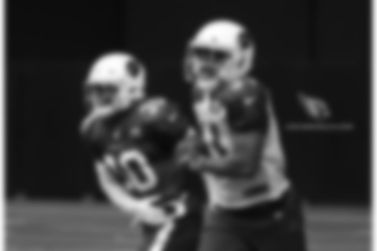 S Rudy Ford and RB David Johnson hav a laugh