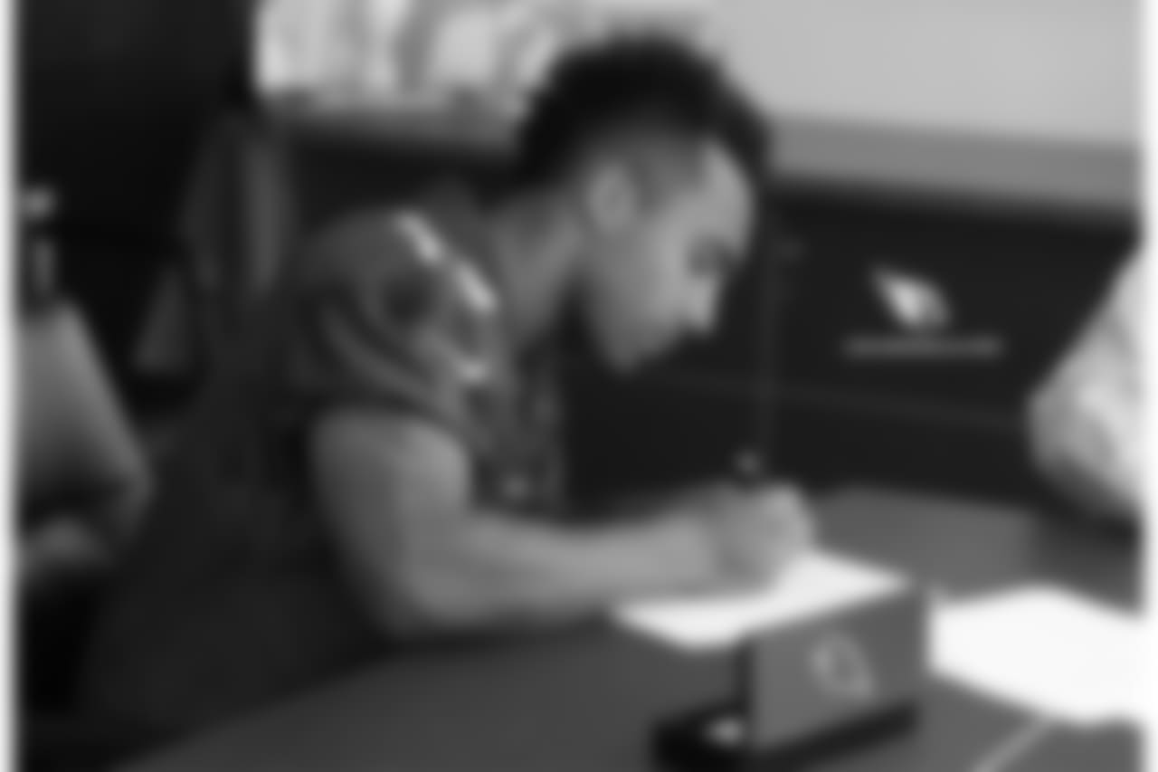 WR Christian Kirk signs his contract