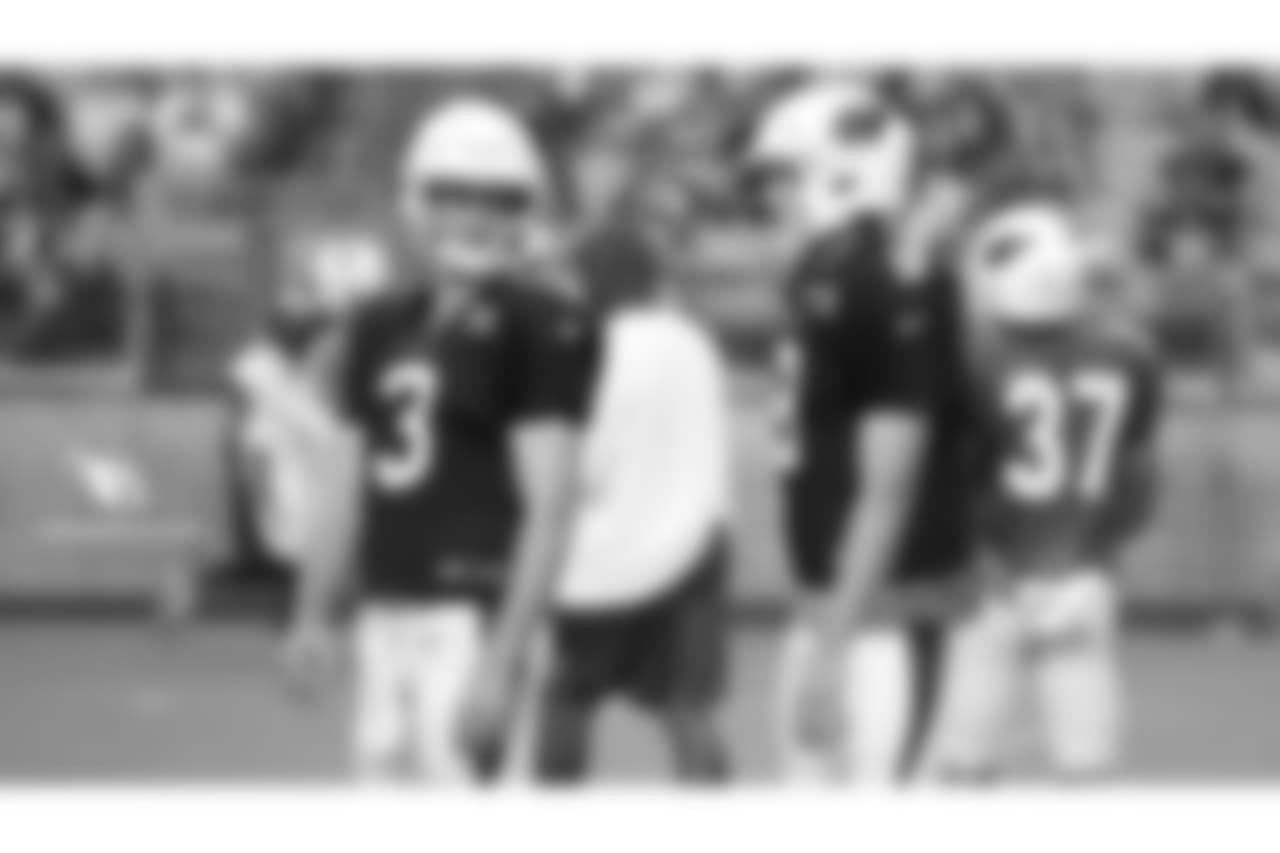 QB Josh Rosen (left) and QB Sam Bradford