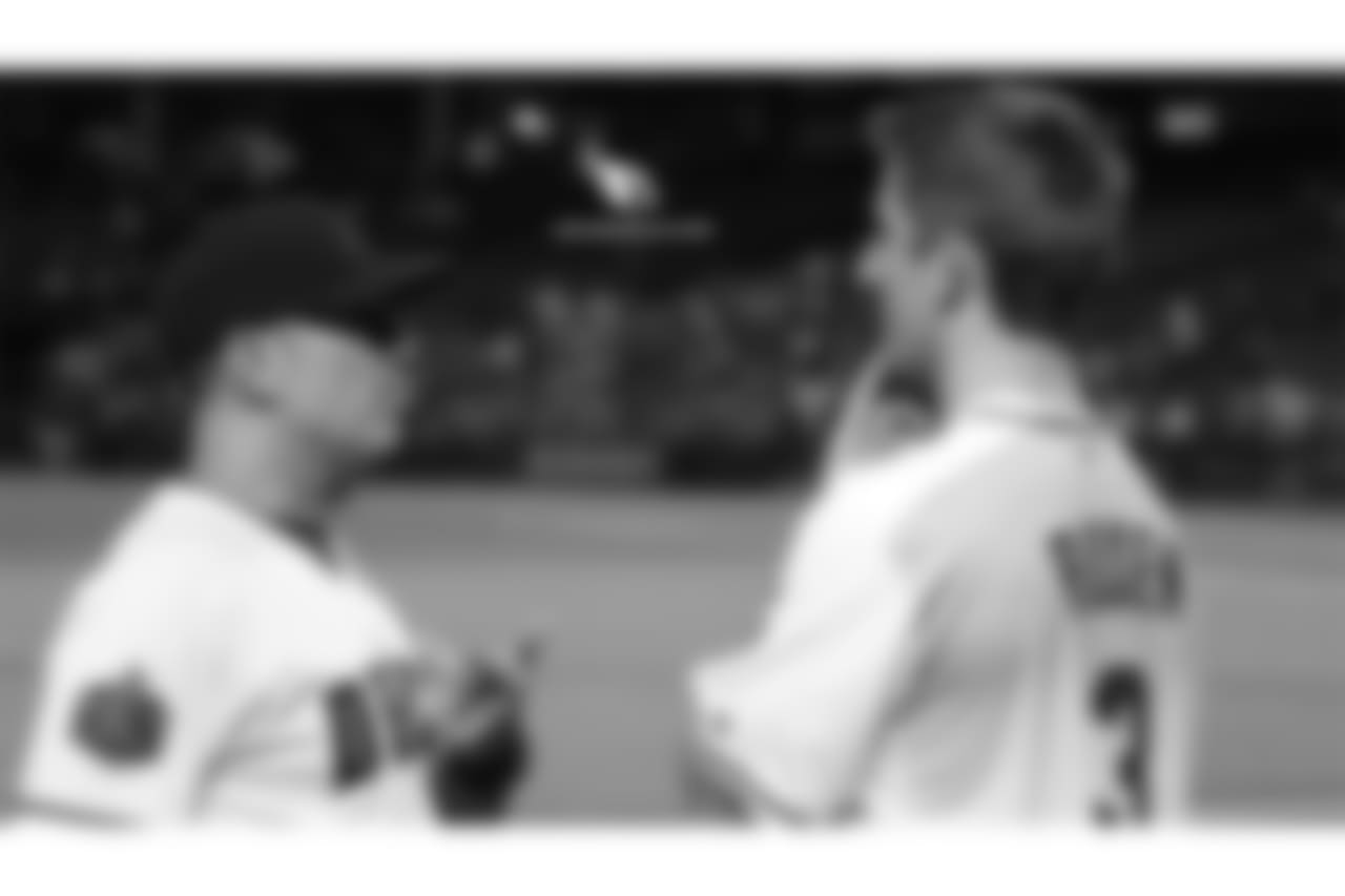 Diamondbacks manager Torey Lovullo (left) and Cardinals QB Josh Rosen