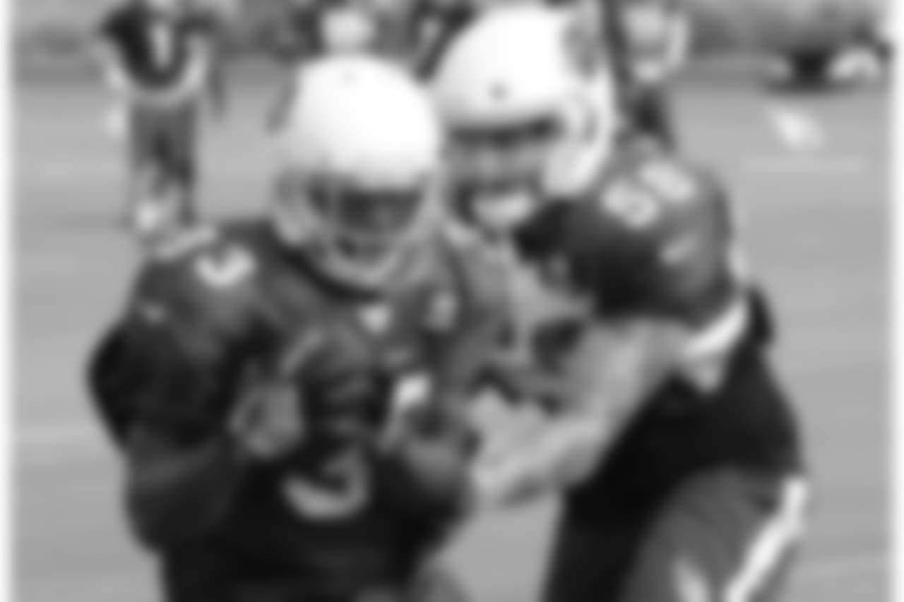 RB Kerwynn Williams (left) and LB Scooby Wright