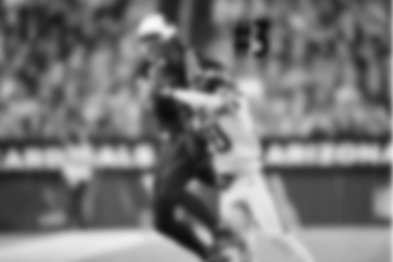 WR Larry Fitzgerald makes a catch on the sideline