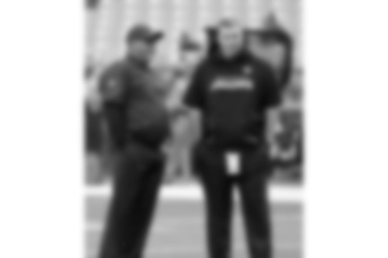 Coach Bruce Arians (left) and Jaguars coach Doug Marrone