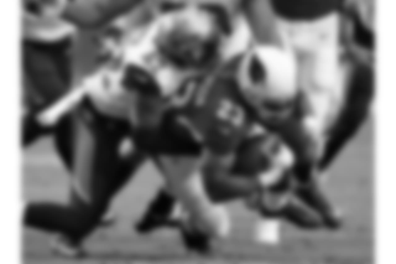 RB Adrian Peterson is brought down