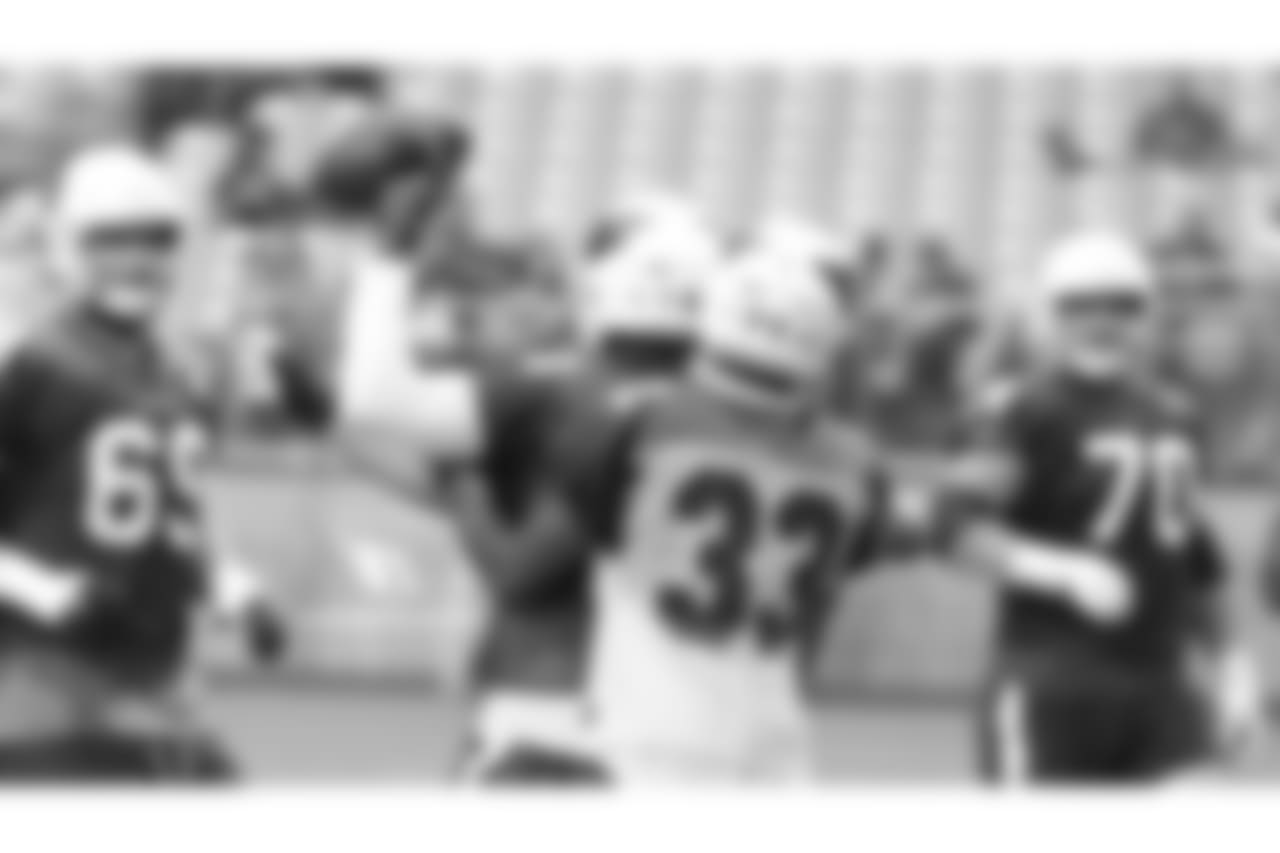 WR Greg Little holds the ball away from CB Christian Campbell