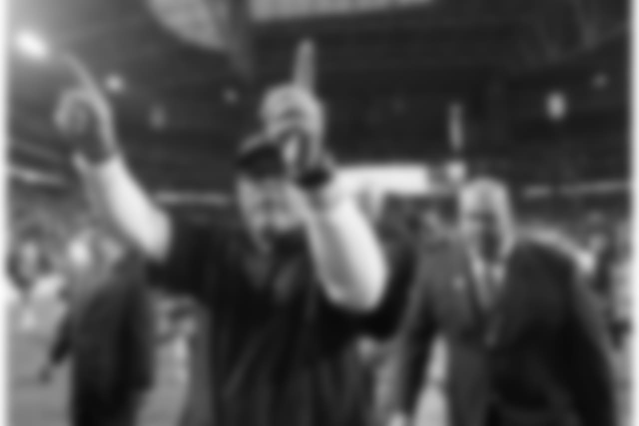 Arians points to the crowd after the playoff win over the Packers