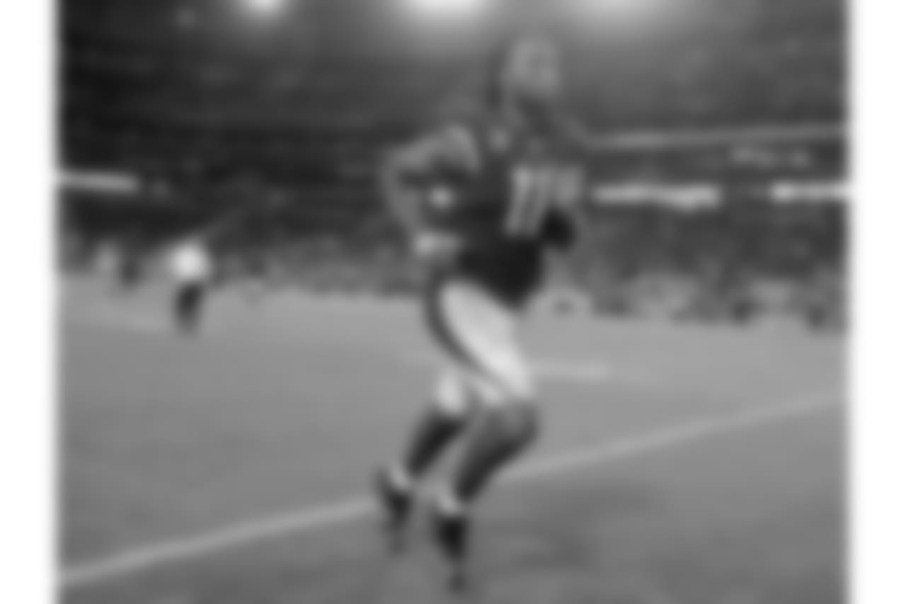 Larry Fitzgerald leaves the field after the loss
