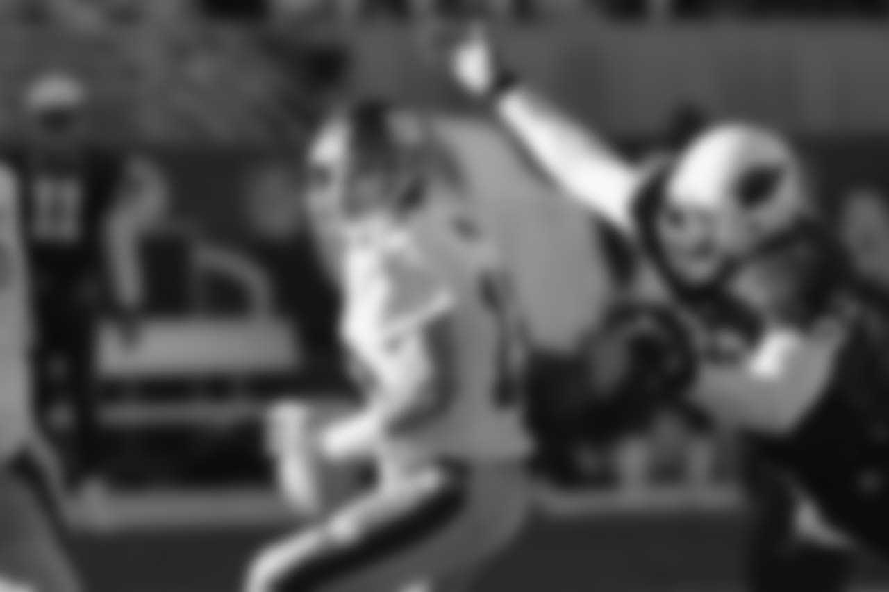 Playing quarterback for the Giants in 2004 -- and getting sacked by Cardinals defensive end Bertrand Berry