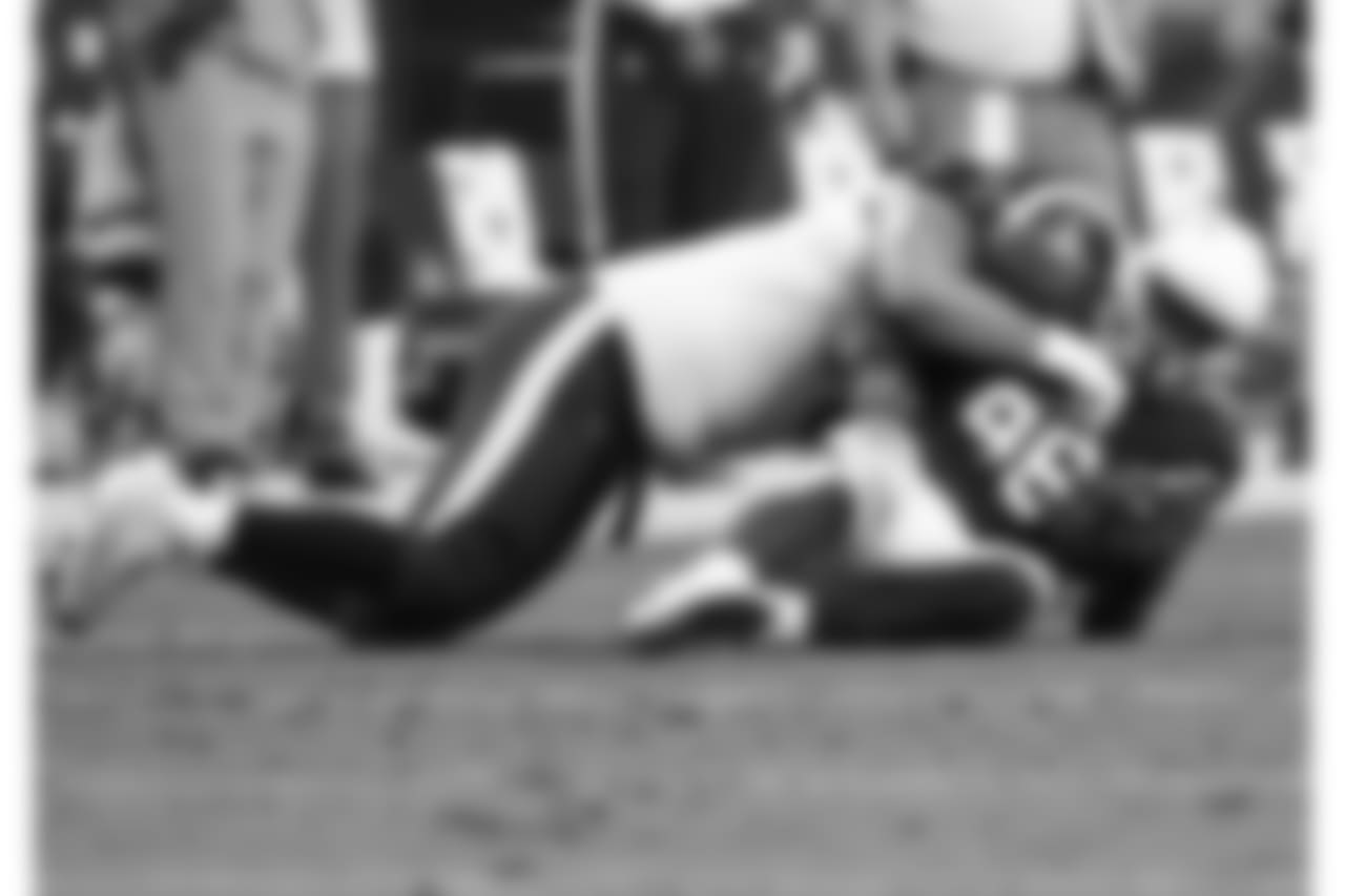 Cardinals LB Kareem Martin is brought down after making his first career interception