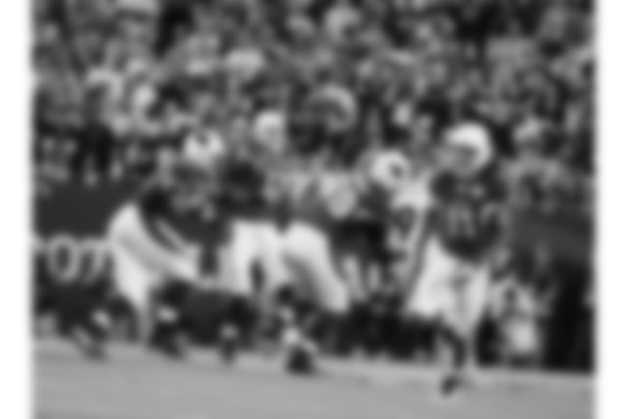 Warner unloads a pass during the Super Bowl