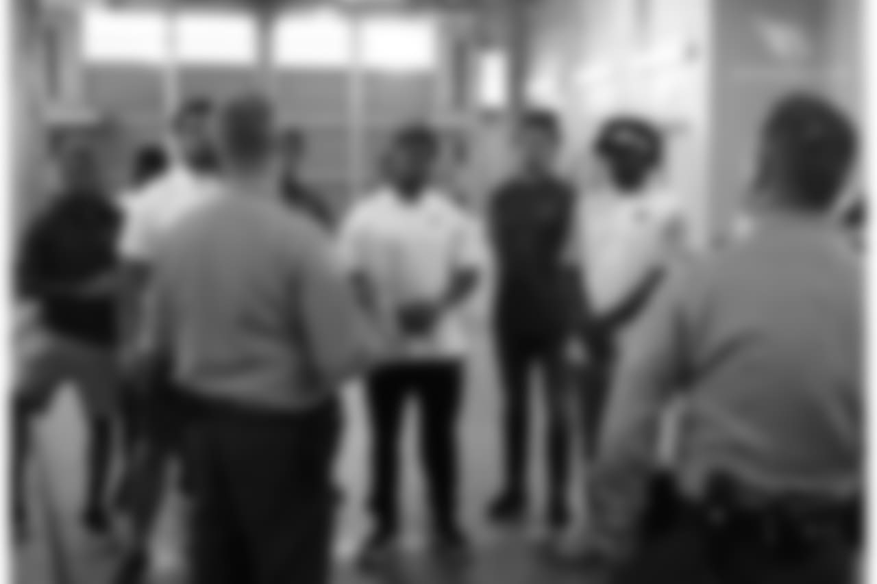 The first group outside the entrance of the jail