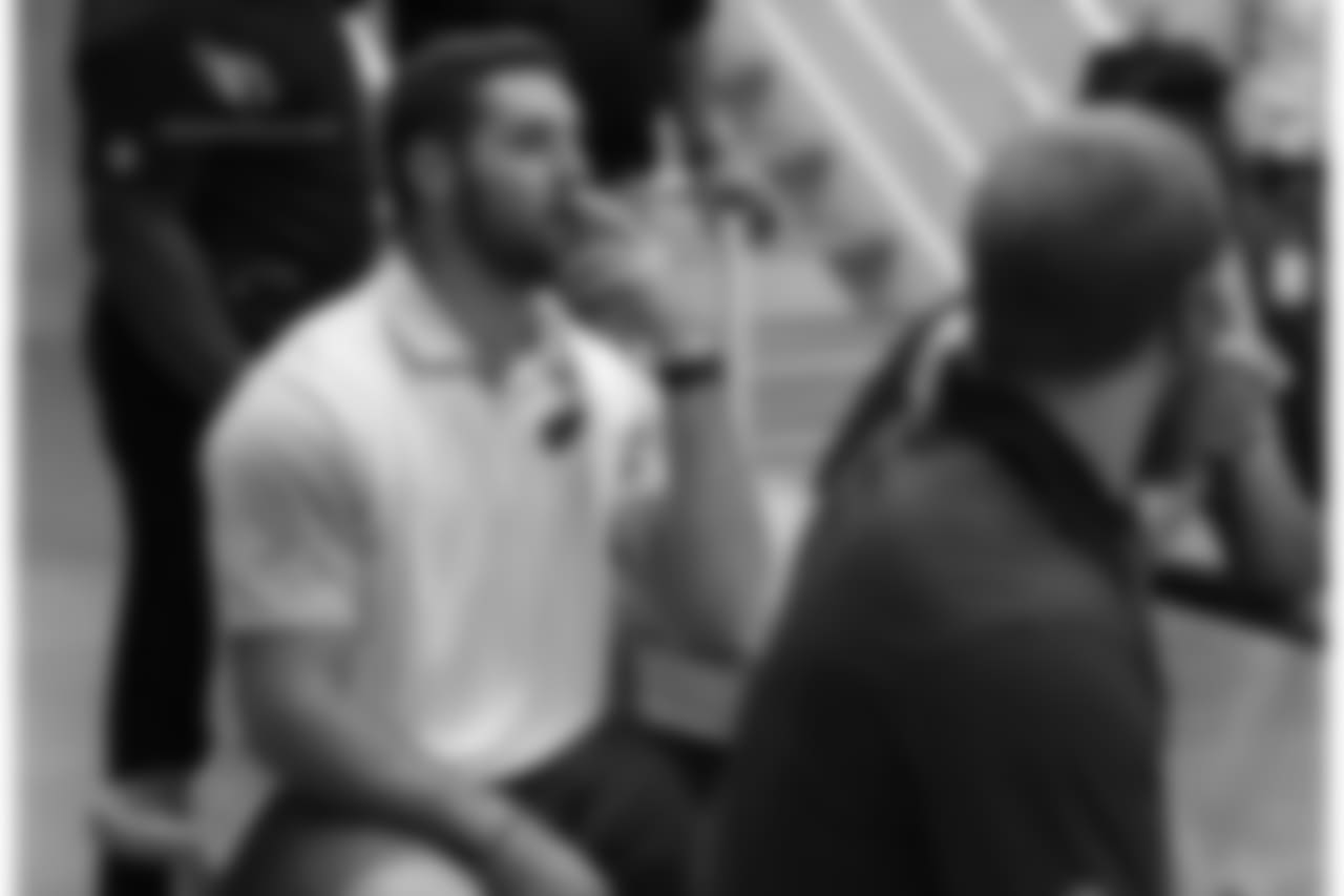QB Trevor Knight listening inside the jail