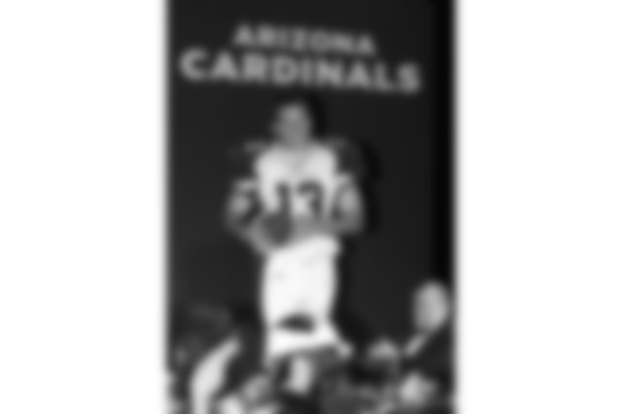 Modeling the new-look Cardinals uniforms in 2005, after signing as a free agent