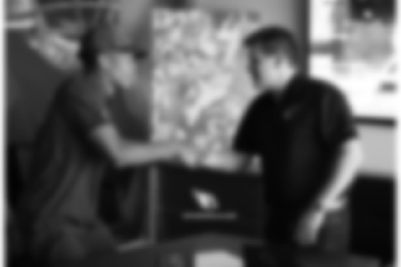 S Chris Campbell shakes hands with Cardinals president Michael Bidwill
